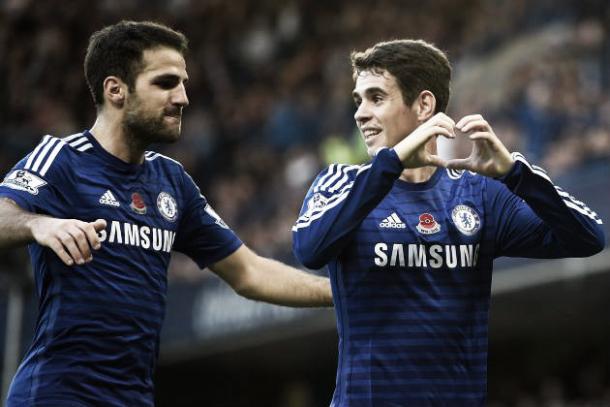 Fábregas y Oscar celebrando un gol. Foto: Getty Images.