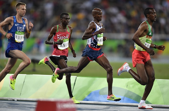 (L-R) Galen Rupp, Paul Tenui, Mo Farah and Tamirat Tola during the latter stages of the final (AFP/)