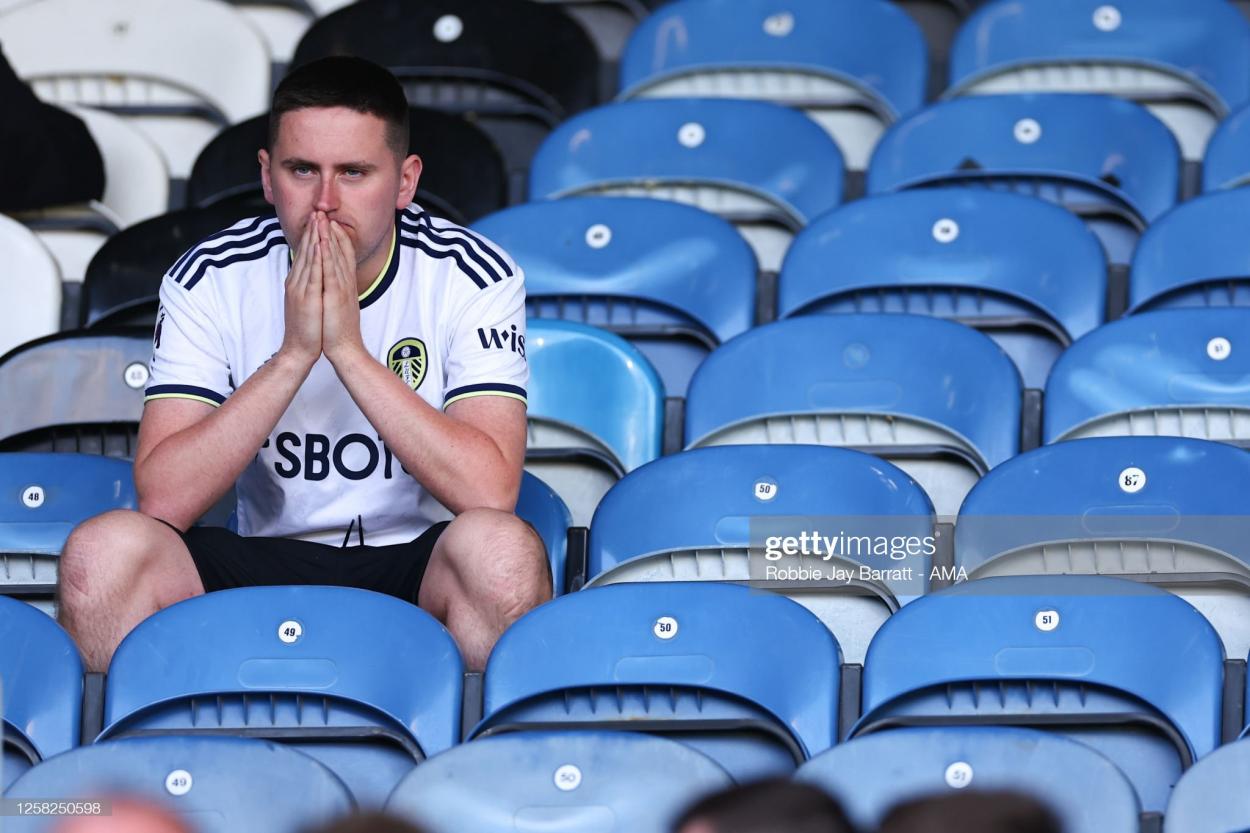 A dejected Leeds fan at full time - (Photo by Robbie Jay Barratt - AMA/Getty Images)