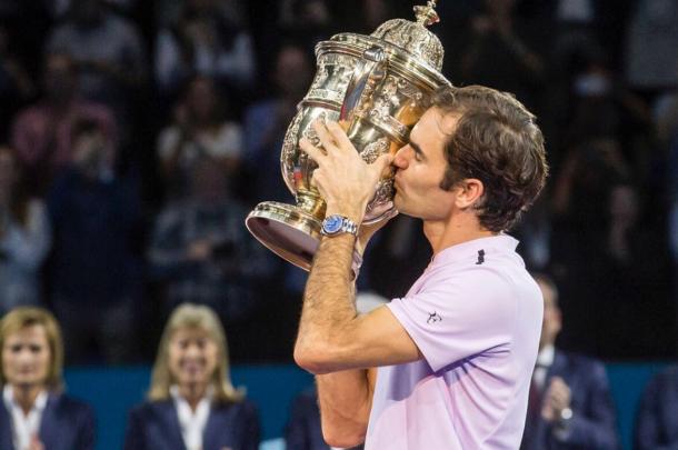 Federer kisses his hometown trophy in Basel last fall. Photo: Reuters