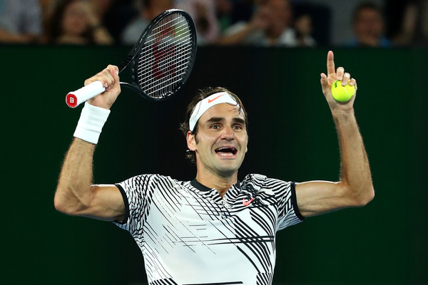 Federer reacts to winning the Australian Open final earlier this year in his comeback tournament. Photo: Cameron Spencer/Getty Images