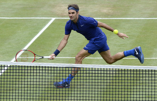 Roger Federer hits a volley last week in Stuttgart. Photo: Daniel Kopatsch/Bongarts