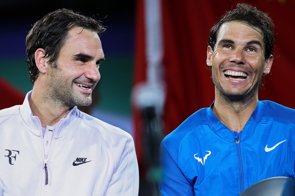 Federer and Nadal share a laugh after their Shanghai final last fall. Photo: Lintao Zhang/Getty Images