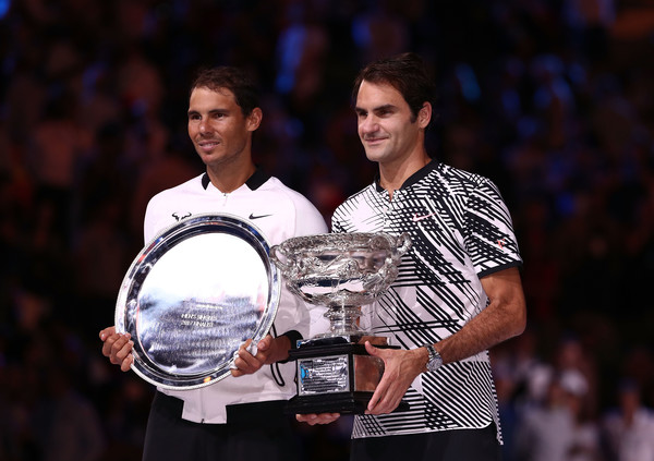 Nadal (left) and Roger Federer hold their trophies following this year's Australian Open final, the first of Federer's three victories over Nadal this year. Photo: Scott Barbour/Getty Images