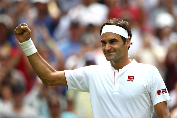 Roger Federer celebrates one of his dominant wins in the early rounds of Wimbledon. Photo: Clive Mason/Getty Images