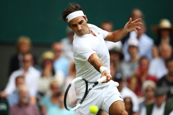 Federer strikes a forehand during his second-round win. Photo: Clive Mason/Getty Images