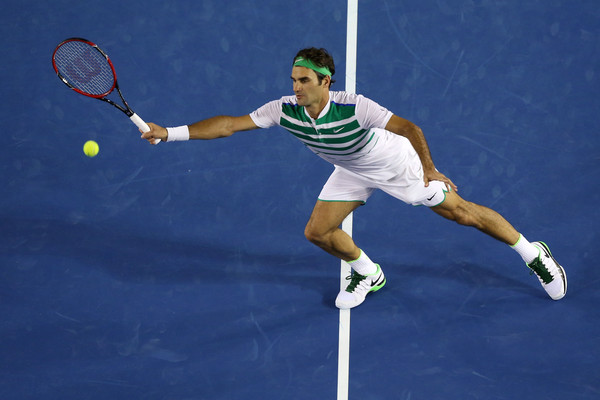 Roger Federer hits a volley during his third round match. Photo: Michael Dodge/Getty Images