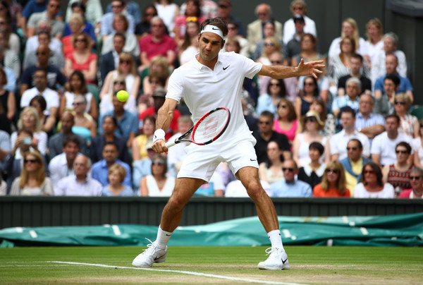 Federer hits a backhand during his semifinal loss. Photo: Clive Brunskill/Getty Images