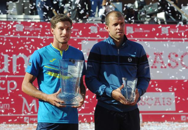 Pablo Carreno Busta and Giulles Muller with their titles. (Photo by Millennium Estoril Open)