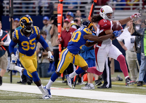 Larry Fitzgerald running after the catch against the St. Louis Rams