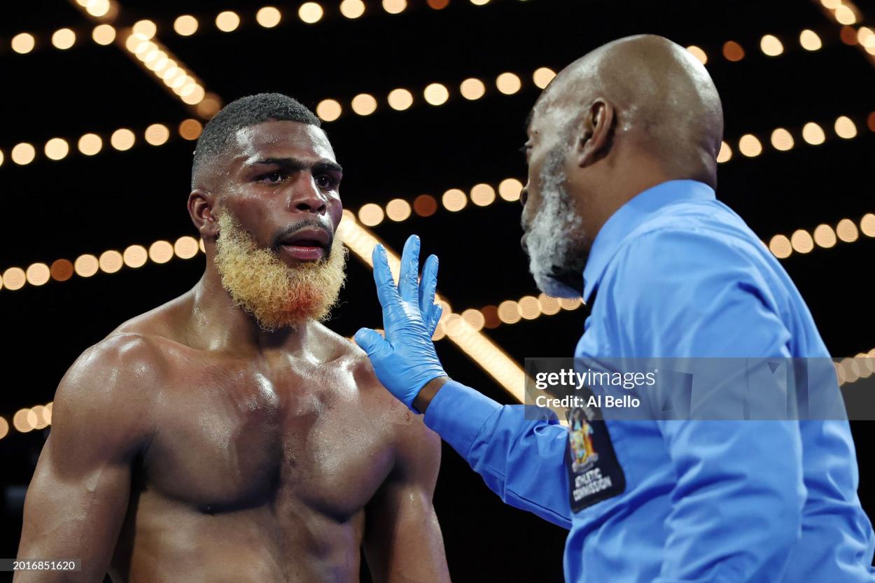 NEW YORK, NEW YORK - FEBRUARY 16: Abraham Nova looks toward the referee against O’Shaquie Foster (not pictured) during their WBC Junior Lightweight World title fight at The Theatre at Madison Square Garden on February 16, 2024 in New York City. Foster won by split decision. (Photo by Al Bello/Getty Images)