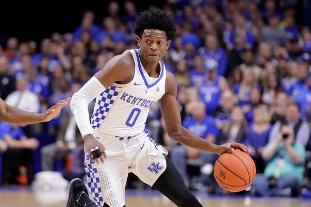 De'Aaron Fox of the Kentucky driving past defenders via Andy Lyons/Getty Images