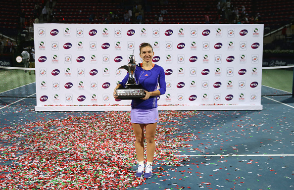 Simona Halep poses with the trophy after winning the tournament in 2015 (Getty/Francois Nel)