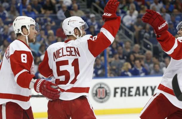 Frans Nielsen celebrate a goal with his teammates. | Photo credit: Kim Klement, USA Today Sports