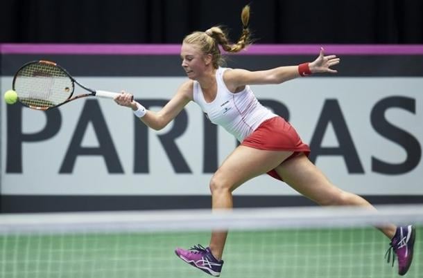 Magdalena Frech stretches for a forehand during her comeback victory. Photo: Adam Nurkiewicz/Fed Cup