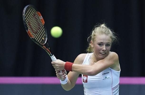 Magdalena Frech hits a backhand during her loss to Hsu. Photo: Adam Nurkiewicz/Fed Cup