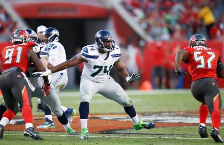 George Fant (74) was point in at left tackle after not playing football since he was in eight grade | Source: Joe Robbins - Getty Images