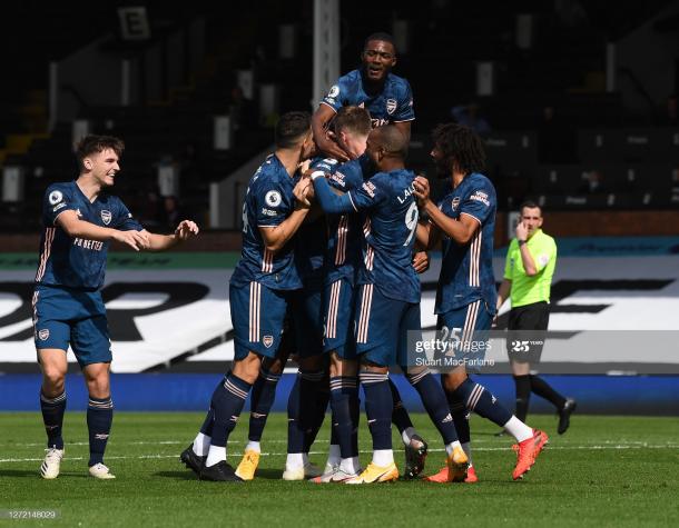 The Arsenal players celebrate with Gabriel after he scored a goal on his debut. (Photo by Stuart MacFarlane/Arsenal FC via Getty Images)