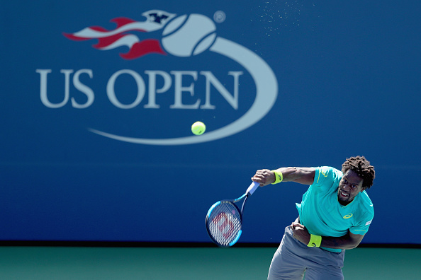 Gael Monfils serving up a two-set lead (Photo: Richard Heathcote/Getty Images)