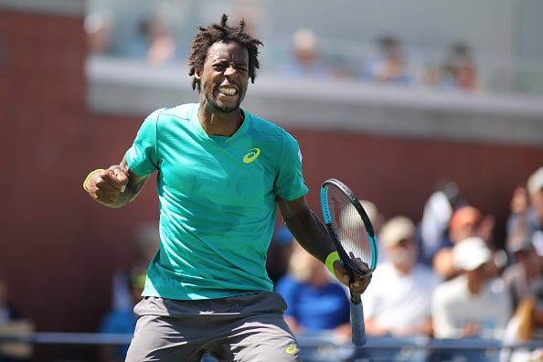 Gael Monfils celebrates advancing to the second round (Photo: Richard Heathcote/Getty Images)