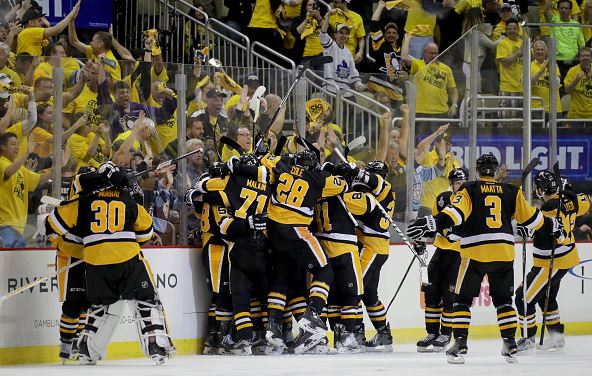The Pittsburgh Penguins celebrate Conor Sheary's game-winning goal against the San Jose Sharks in game two of the 2016 Stanley Cup Finals | Bruce Bennett - Getty Images