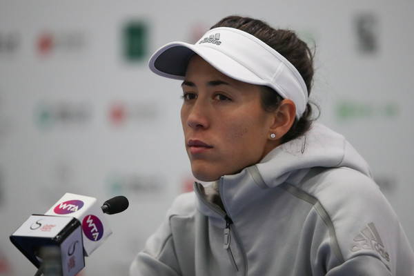 Garbine Muguruza speaking at her post-match press conference in Beijing, where she had to retire in her first round match | Photo: Lintao Zhang/Getty Images Asia Pacific