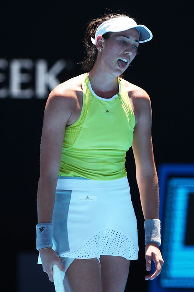 Muguruza was in poor spirits throughout the encounter, seemingly being affected by the heat | Photo: Clive Brunskill/Getty Images AsiaPac