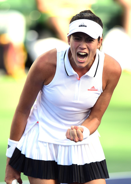 Garbiñe Muguruza celebrates after winning a point during her fourth-round match against Elina Svitolina at the 2017 BNP Paribas Open. | Photo: Harry How/Getty Images