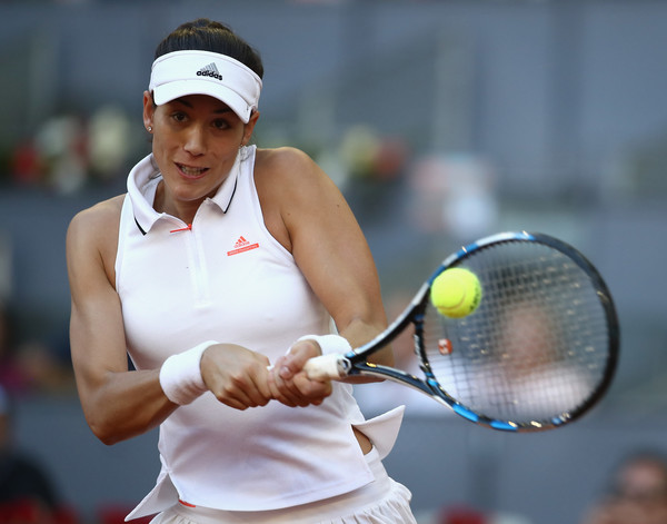 Garbine Muguruza hits a backhand | Photo: Julian Finney/Getty Images Europe