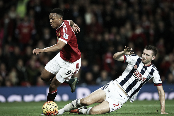 McAuley makes a sliding tackle against Anthony Martial (Getty images)