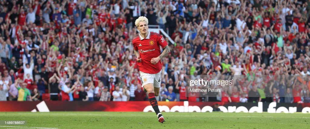 MANCHESTER, ENGLAND - MAY 13: Alejandro Garnacho of Manchester United celebrates scoring their second goalduring the Premier League match between Manchester United and Wolverhampton Wanderers at Old Trafford on May 13, 2023 in Manchester, England. (Photo by Matthew Peters/Manchester United via Getty Images)