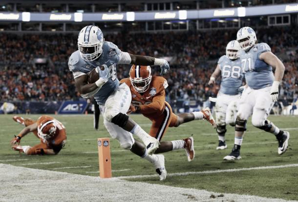 Elijah Hood scores in the ACC Championship against Clemson | Photo: Getty Images