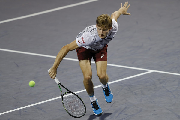 David Goffin chases down a drop shot during his third round win. Photo: Lintao Zhang/Getty Images
