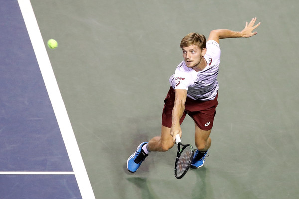 David Goffin lunges for a shot during the Tokyo final. Photo: Chung Sung-Jun/Getty Images