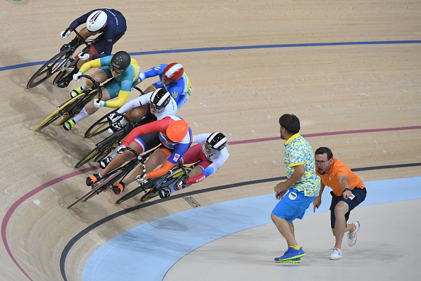 The Keirin finalists come round the final corner, with Elis Ligtlee leading the way (AFP/Greg Baker0