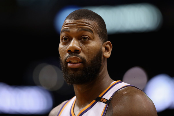 Greg Monroe #14 of the Phoenix Suns reacts to a call during the first half of the NBA game against the Toronto Raptors. |Source: Christian Petersen/Getty Images North America|