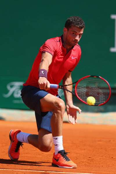 Grigor Dimitrov hitting a backhand at the 2016 Monte Carlo Rolex Masters. | Photo: Michael Steele/Getty Images