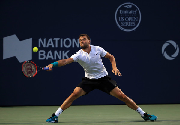 Grigor Dimitrov plays a forehand slice in Montreal/Photo: Vaughn Ridley/Getty Images