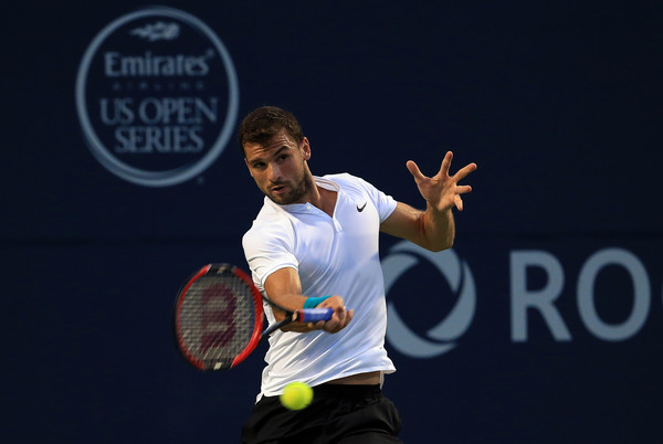 Grigor Dimitrov hits a forehand in Montreal/Photo: Vaughn Ridley/Getty Images
