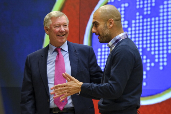 Guardiola has a good relationship with United director Sir Alex Ferguson | Photo: Fabrice Coffrini/AFP