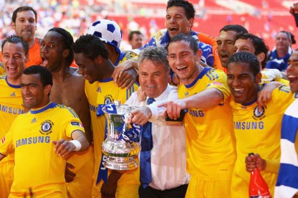 Guus Hiddink celebrates with Chelsea players after 2009 FA Cup victory. | Getty Images