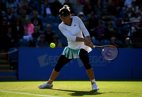 The Romanian played some classic grass court tennis in the match (Photo by Mike Hewitt / Getty)