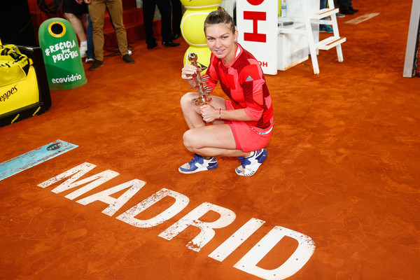 Halep poses with her Madrid trophy in May. Photo: Julian Finney/Getty Images