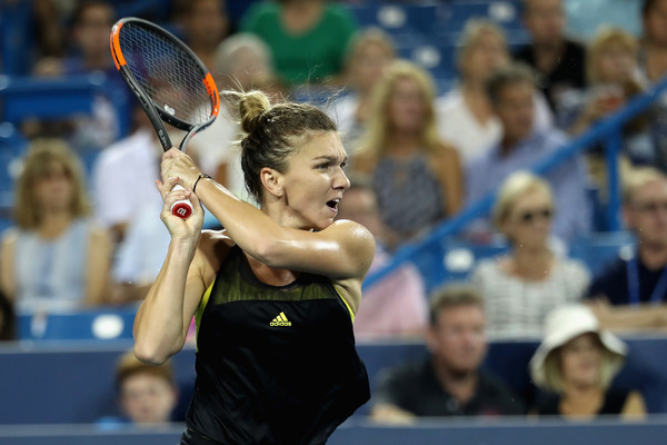 Halep crushes a backhand. Photo: Rob Carr/Getty Images