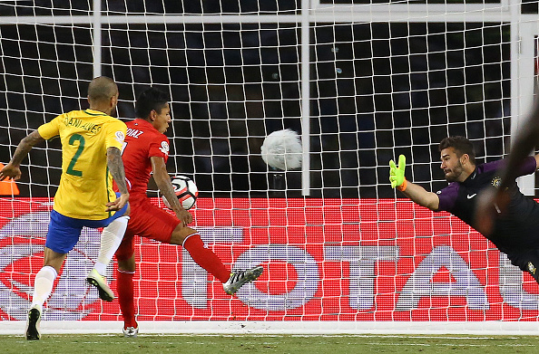 Peru's Raul Ruidiaz handles the ball into the net against Brazil. (Getty)