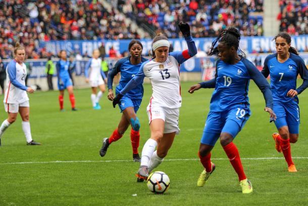 Alex Morgan tries to dribble through the French defense but it stymied by French defender Mbock Bathy. | Photo: Cindy Lara - VAVEL USA