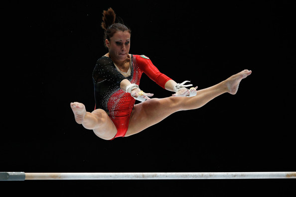 Vanessa Ferrari performs on the uneven bars at the 2013 Word Artistic Gymnastics Championships in Antwerp/Getty Images