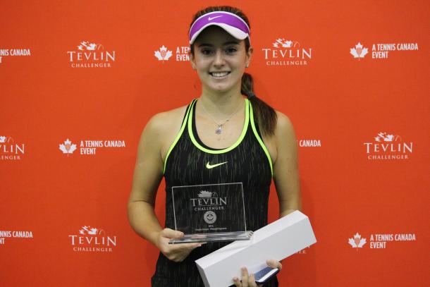 Catherine Bellis poses with the winner’s trophy after defeating Jesika Maleckova in the final of the 2016 Tevlin Challenger. | Photo: Max Gao