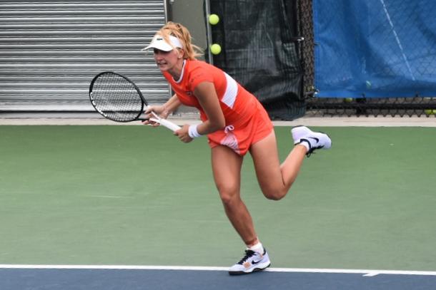 Teichmann serves during her first qualifying round victory/Photo: John Lupo/VAVEL USA