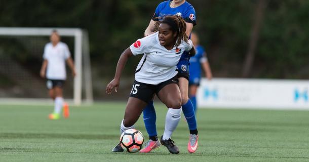 Defender Kayla Mills fighting to clear the ball | Source: Sky Blue FC